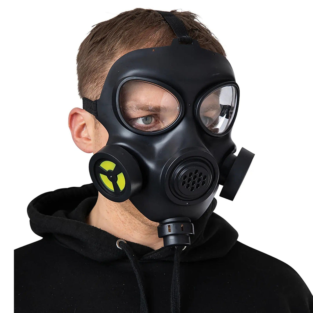 Adult wearing a gas mask in black plastic for Halloween and fancy dress costumes