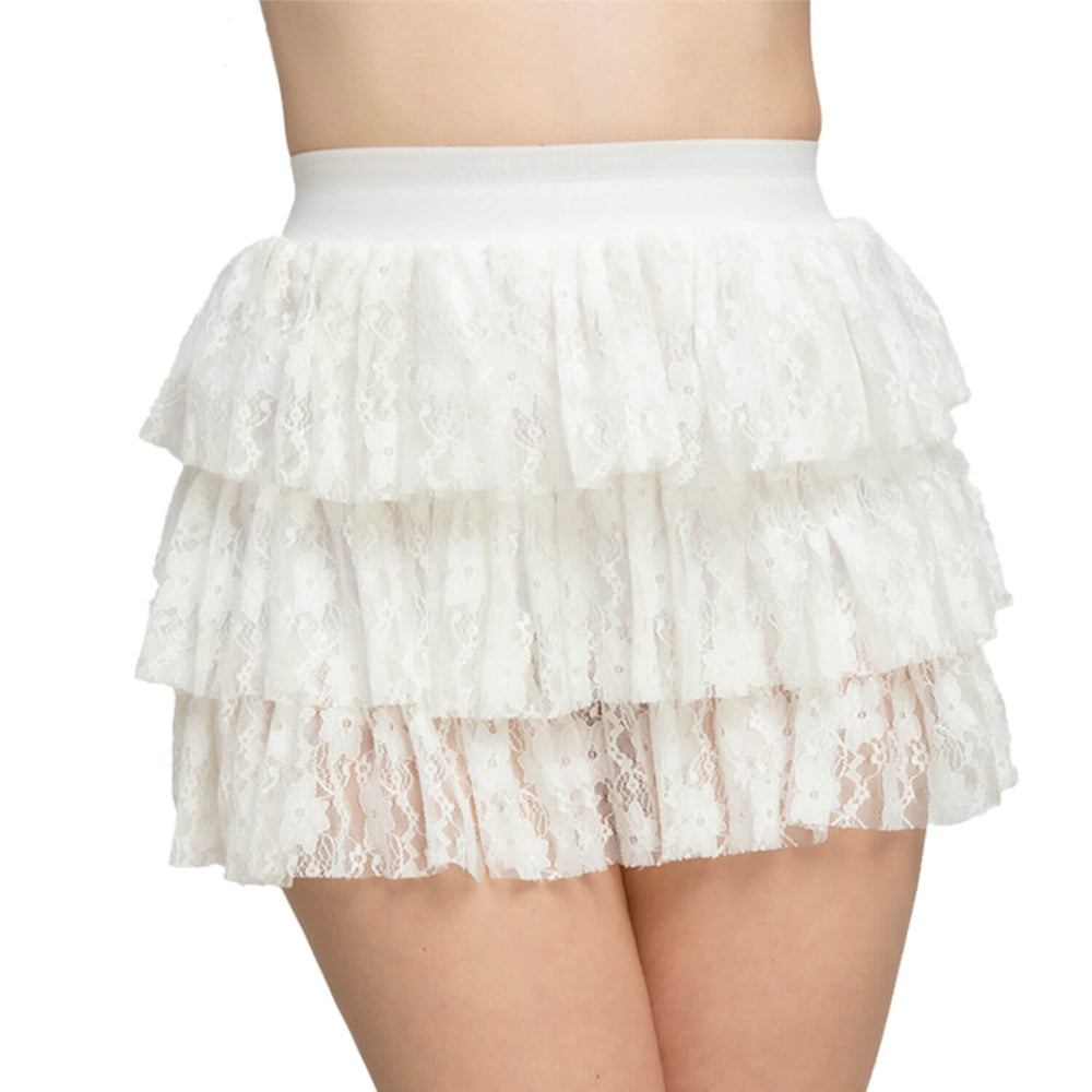 Person wearing a triple layer white lace ra-ra skirt for fancy dress costumes