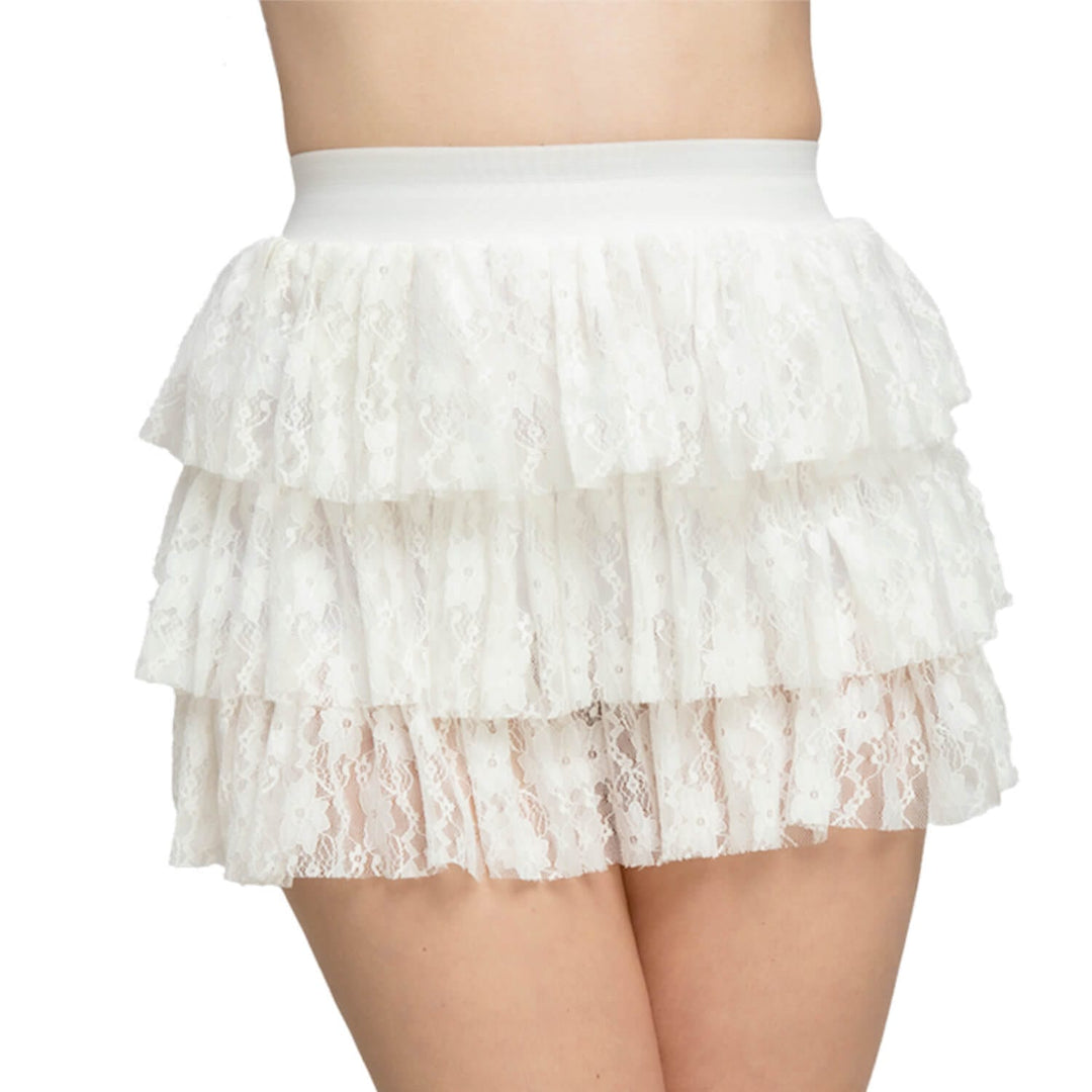 Person wearing a triple layer white lace ra-ra skirt for fancy dress costumes