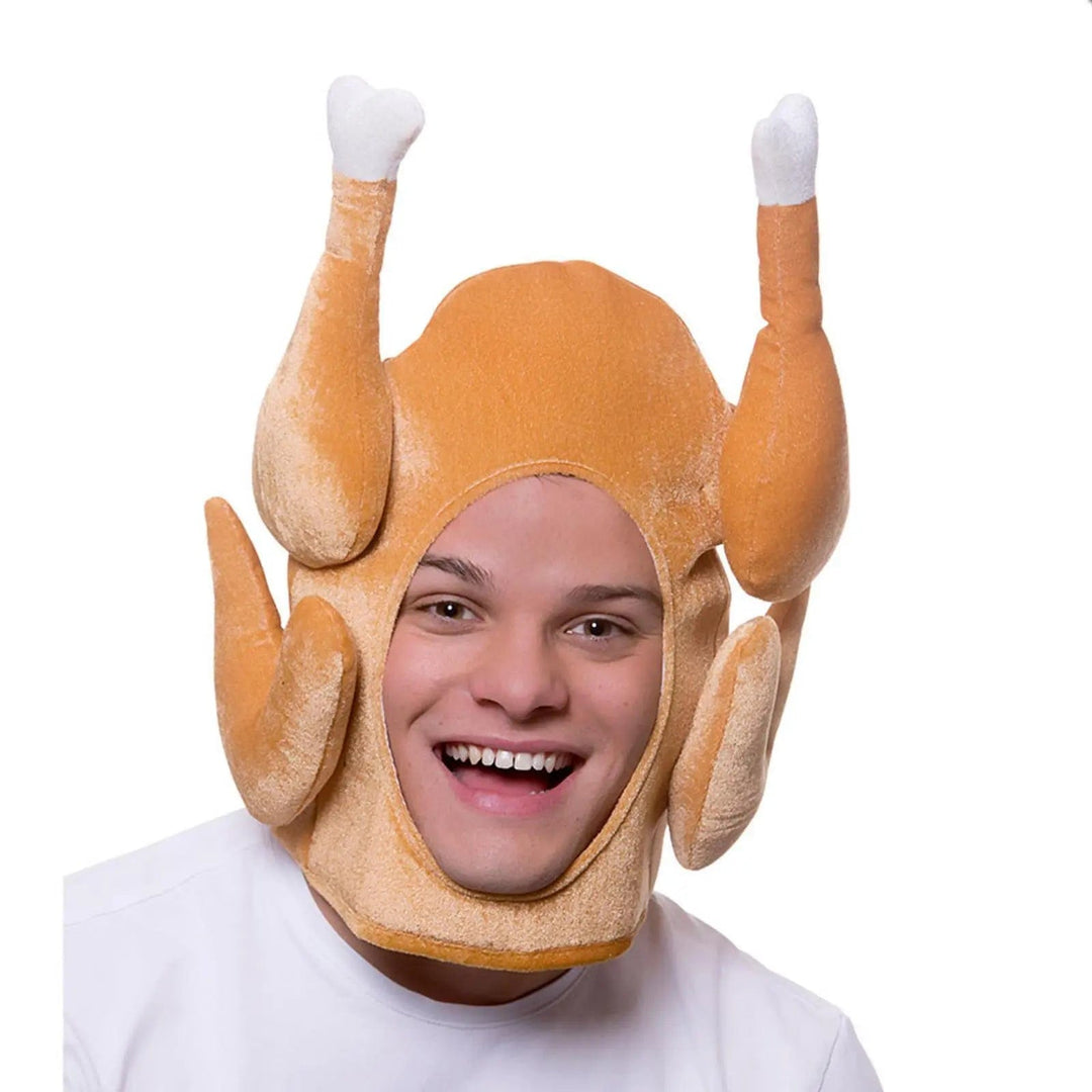 Man wearing a funny turkey hat for Christmas fancy dress parties