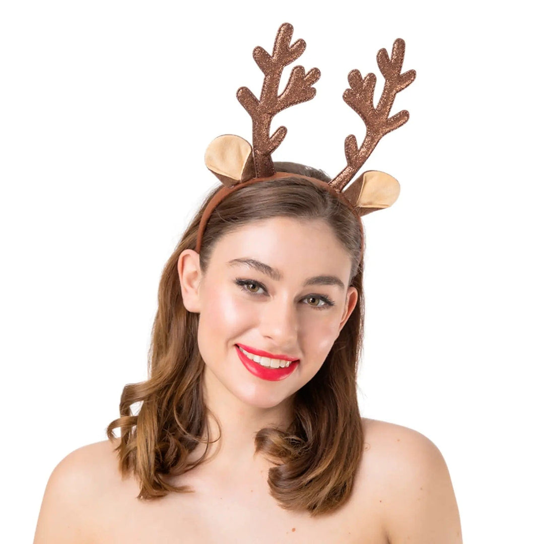 Lady wearing a Christmas headband with bronze glitter reindeer antlers