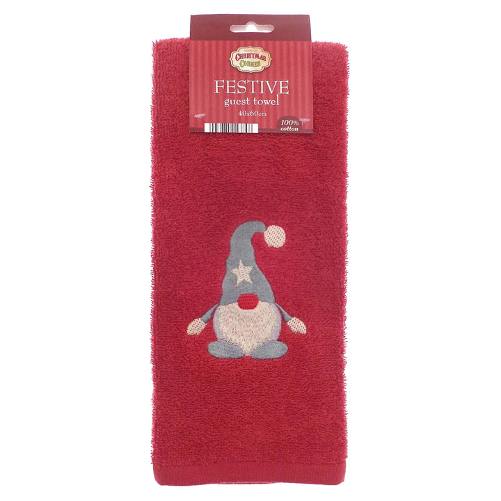 Festive guest towel in red with embroidered gonk in a grey hat with silver star