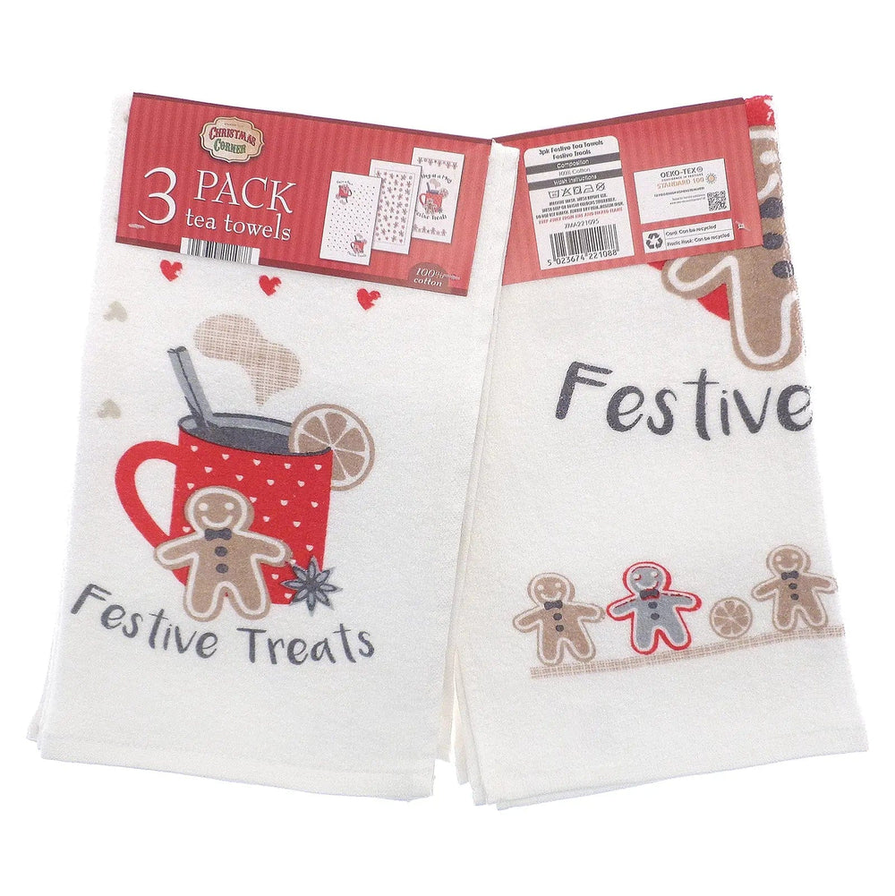 Pack of 3 festive tea towels in white with festive treats, mug and gingerbread man design