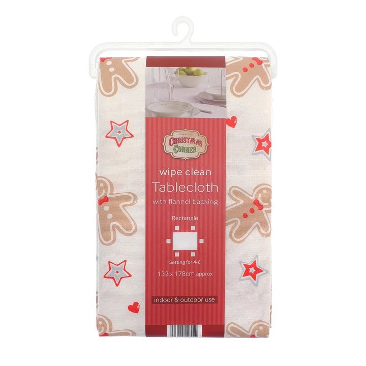 Christmas tablecloth with wipe clean surface and gingerbread biscuits and stars design