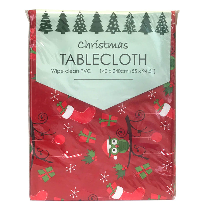 Packaged Christmas tablecloth with festive design on a white background