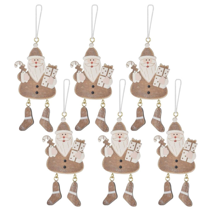 set of wooden Santa Christmas tree decorations on a white background