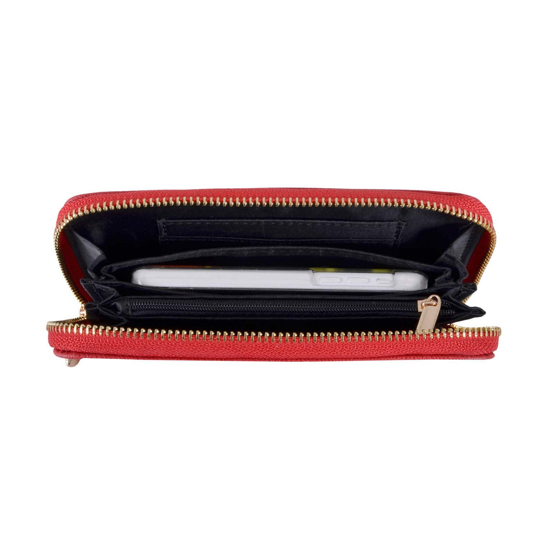 Red purse with gold zip open to show smart phone inside a compartment