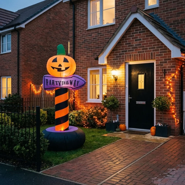 inflatable party sign in front garden beside front door

