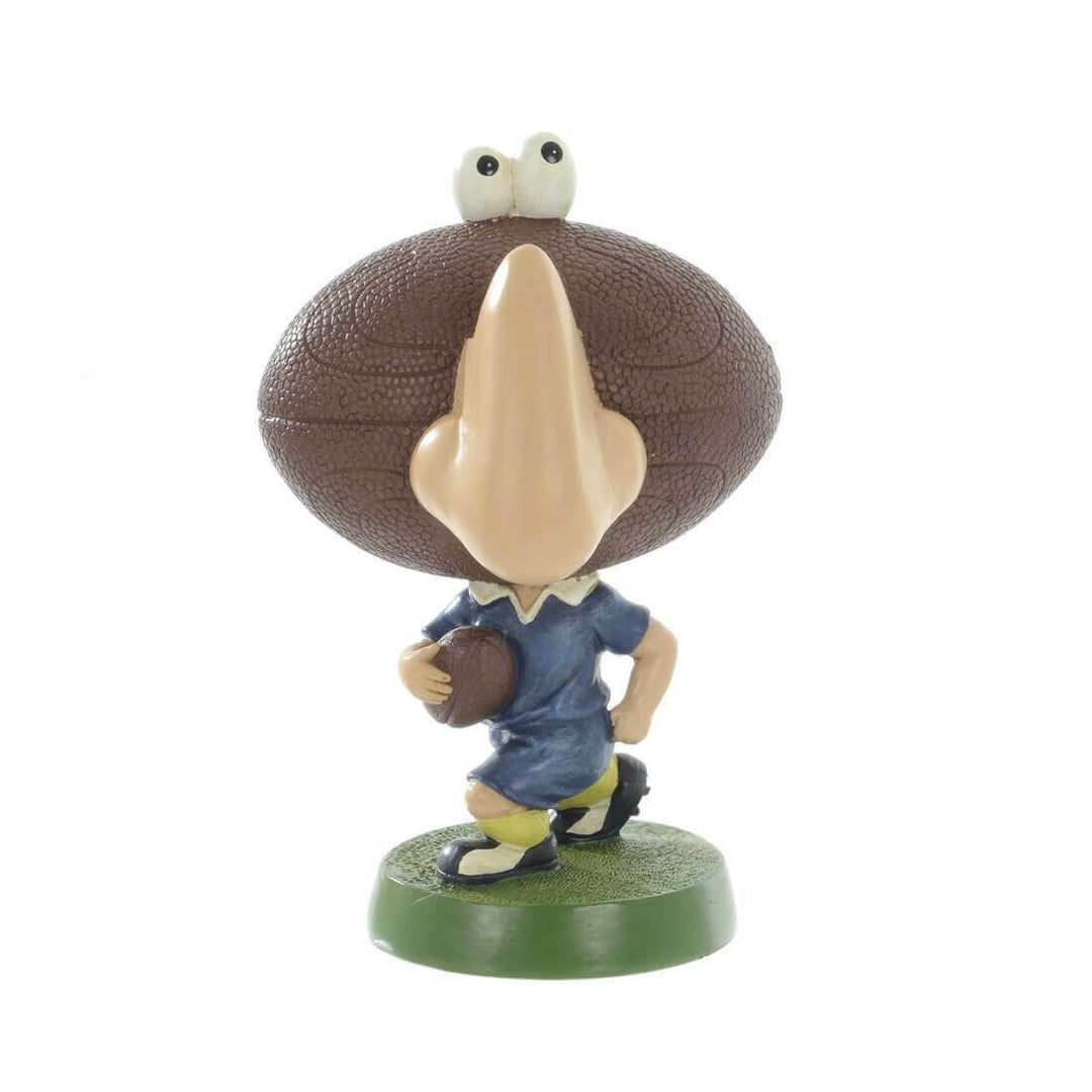 Rugby figure with rugby ball shaped head for olding reading glasses