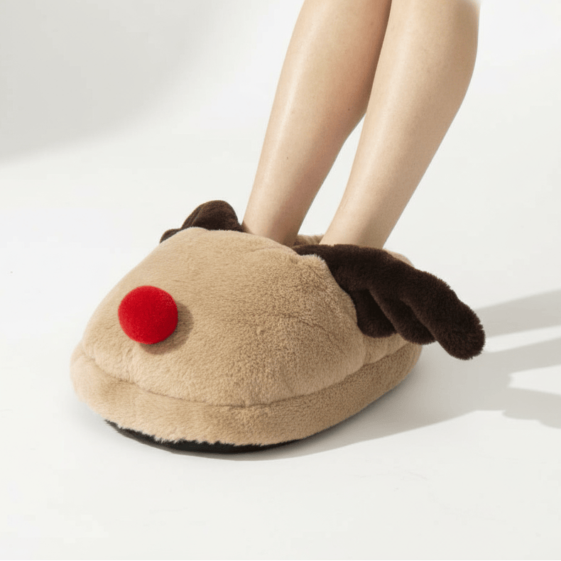 Beige Single Large Foot Warmer slipper with reindeer design worn by a person on a white background