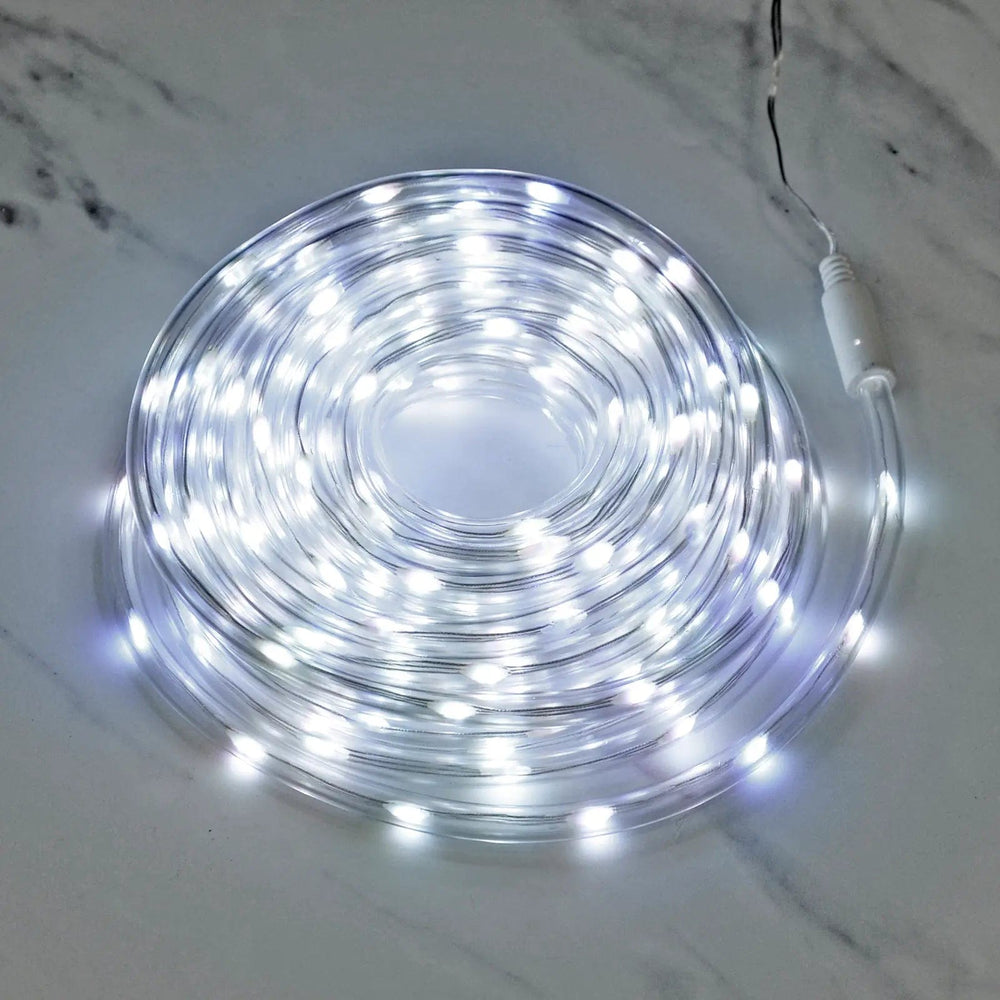 Cool white LED rope light rolled on a marble floor