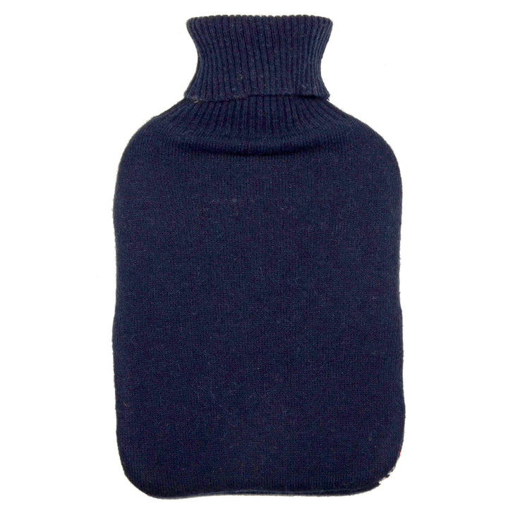 Plain dark blue hot water bottle on a white background