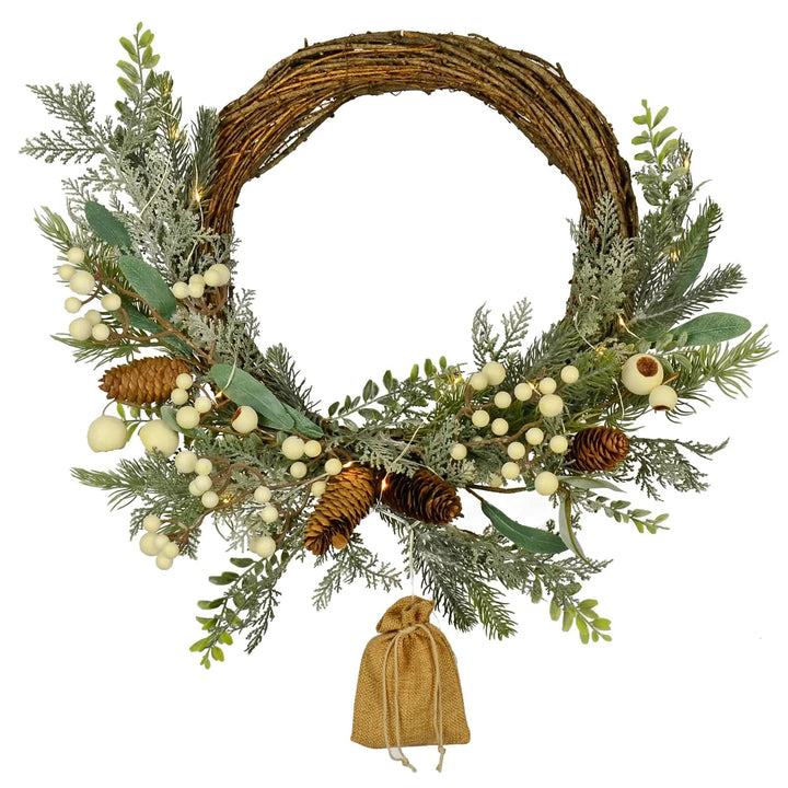 Christmas wreath with pine cones, snowberries, rattan base, fairy lights and jute bag