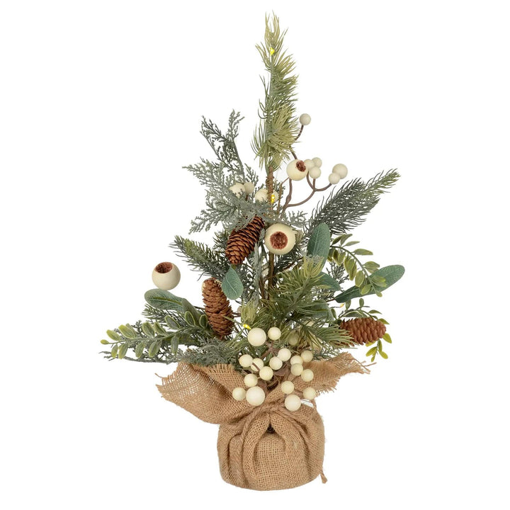 Christmas tree with pine cones, white berries and brown fabric base