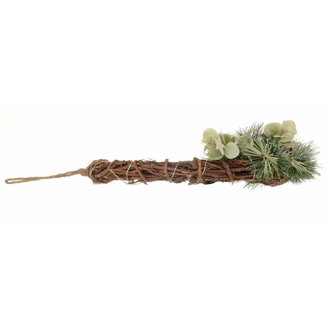 Side view of a woven rattan Christmas half wreath with hanging loop