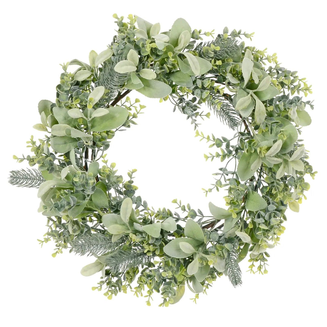 Green foliage Christmas wreath with spruce, lamb's ear and eucalyptus branches on a wire frame