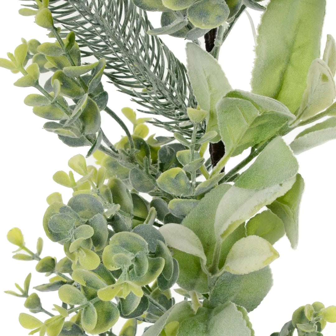 Close up of wucalyptus, lamb's ear and spruce branches on a Christmas garland