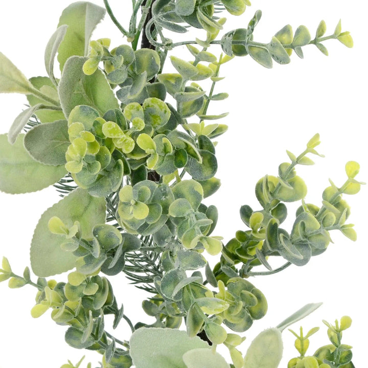 Green eucalyptus branches on a festive garland for Christmas decorations