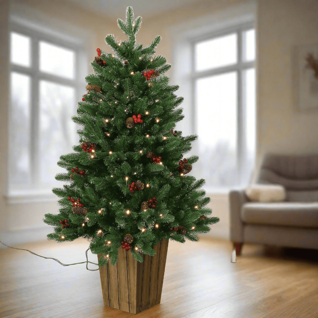 4ft Pre-Lit Tree in the Living room on a wooden floor