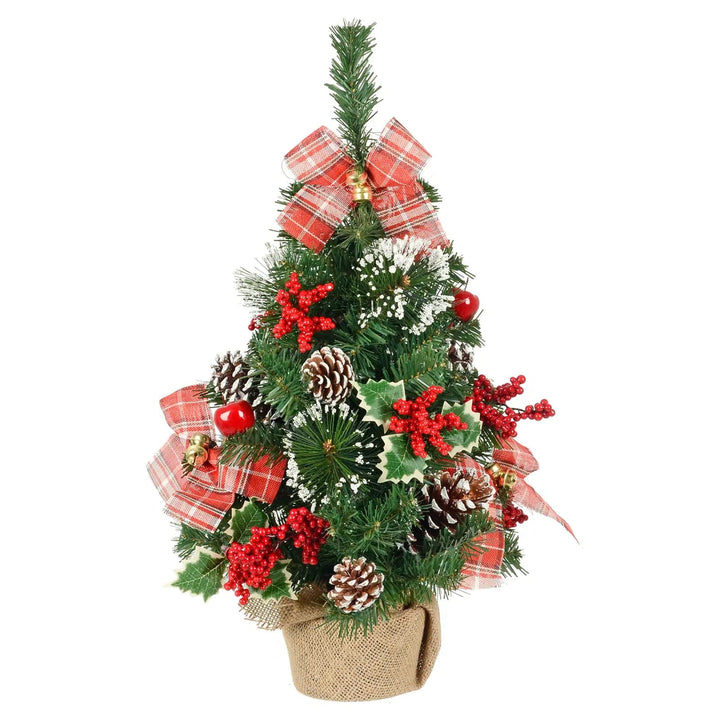 Small Christmas tree decorated with red tartan bows, gold bells, berries, holly and pine cones