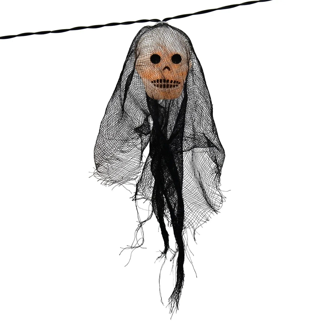 Skeleton head string light with black fabric cover and warm white LED light