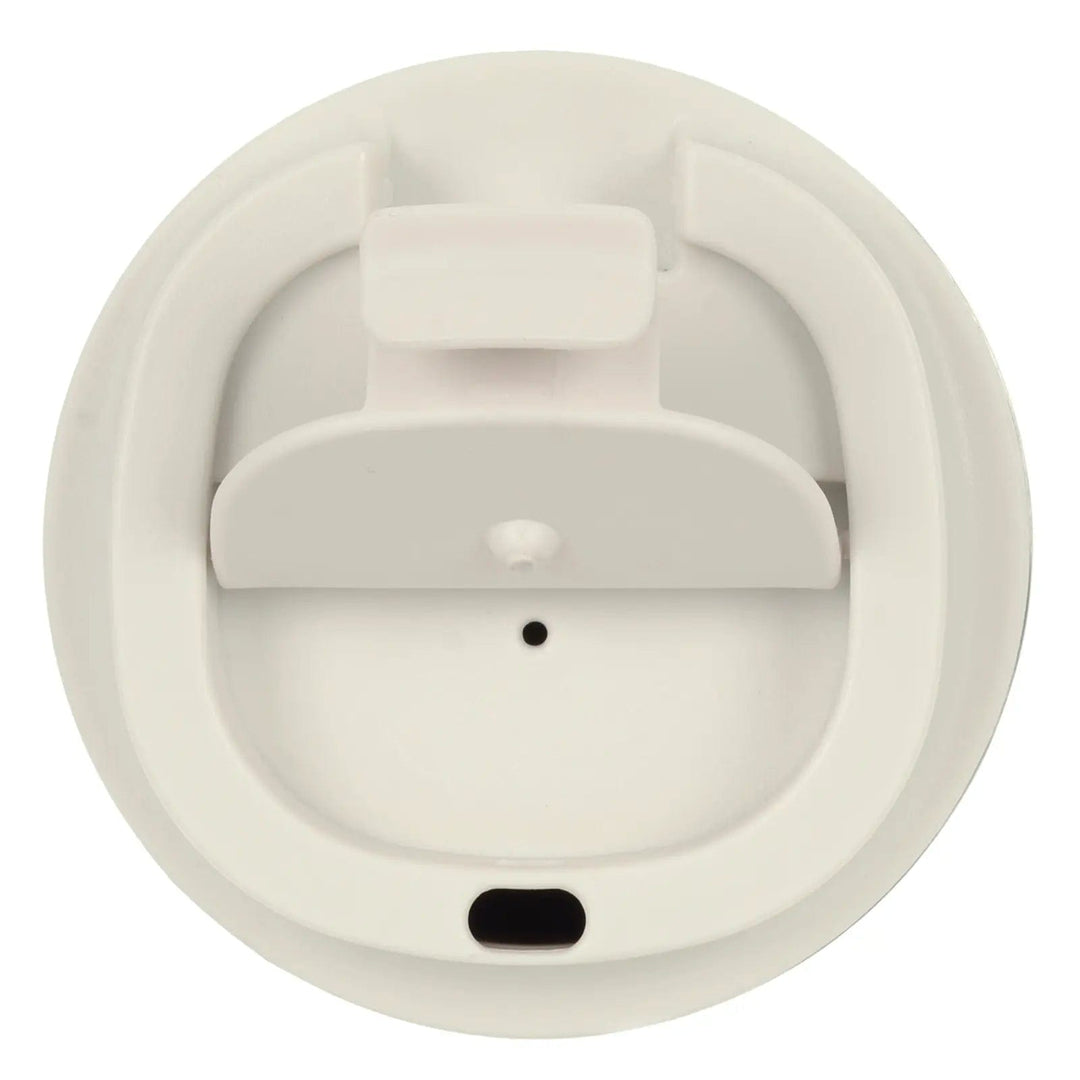 Overhead view of white insulated coffee mug showing mouthpiece hole and air vent hole on lid