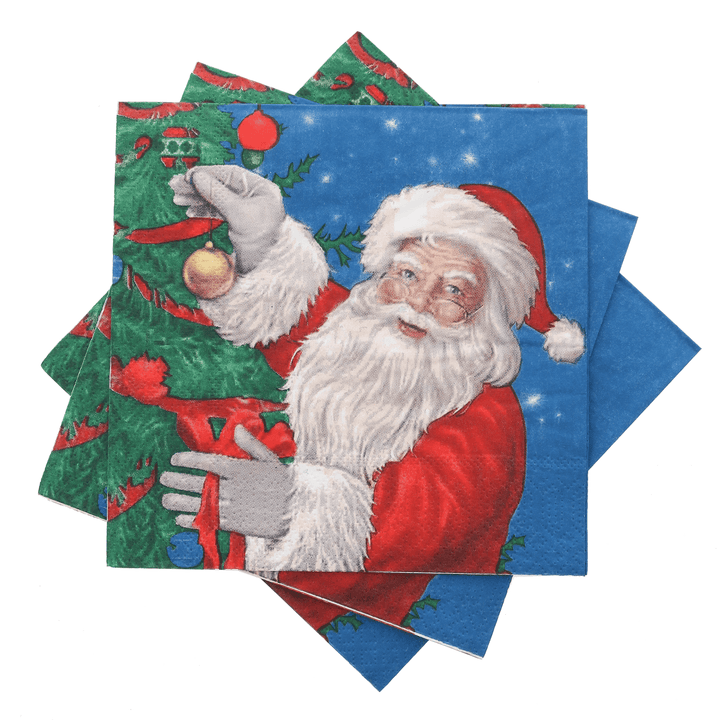 3 napkins spread out featuring vibrant santa decorating christmas tree design