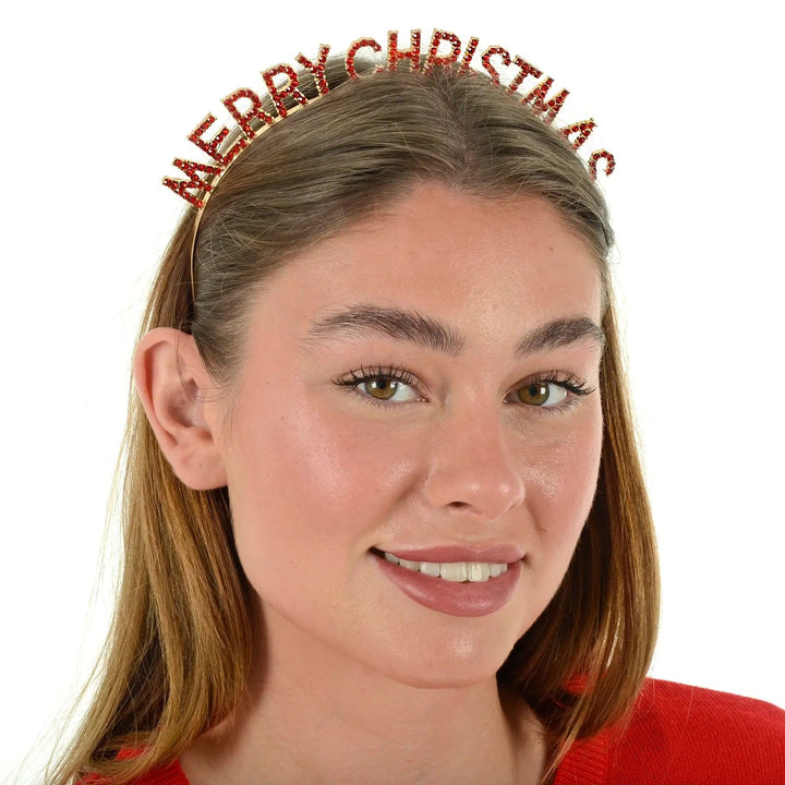 Female model wearing a Merry Christmas headband with red diamante letter and gold hairband