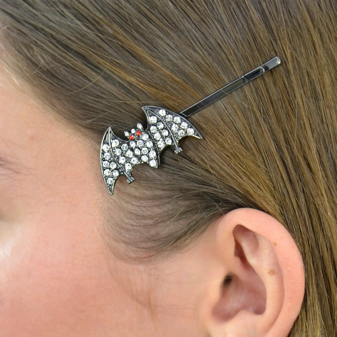 Model wearing a hair slide with black bat decorated with sparkling diamante for Halloween parties