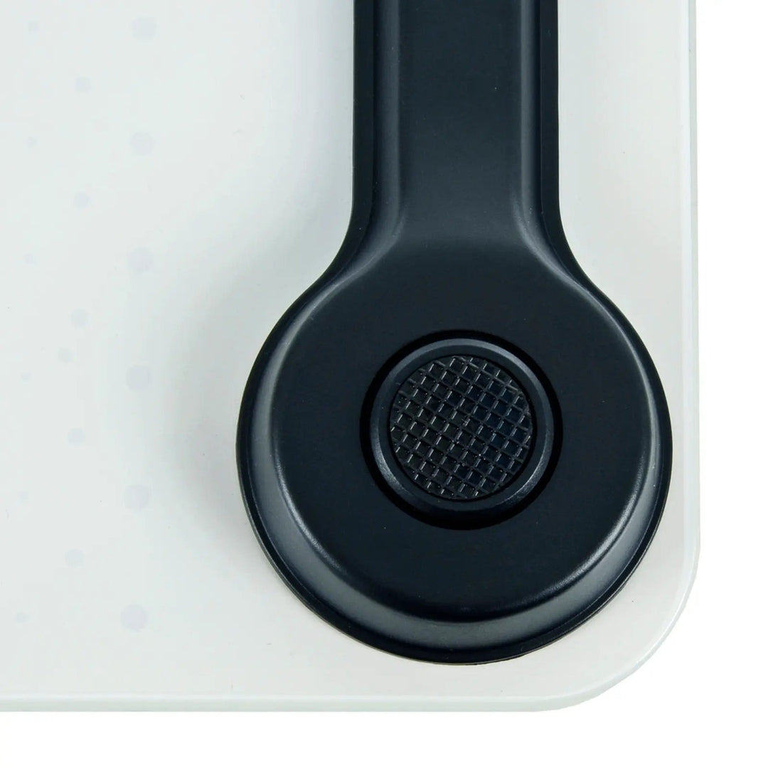 Close up of black foot with textured rubber to prevent the bathroom scales slipping