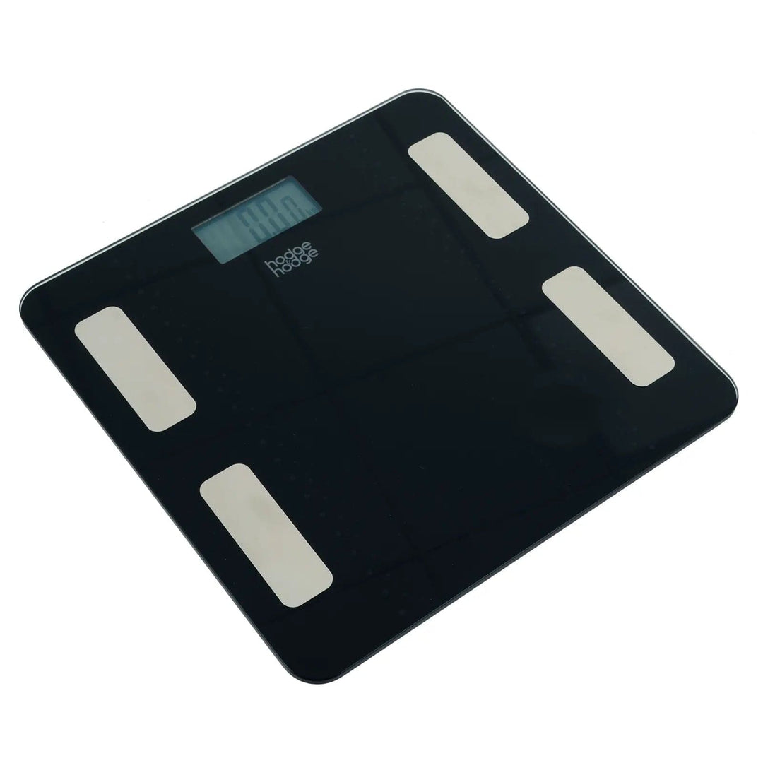 Black bathroom scales with large LCD display, 4 silver sensors on a glass platform