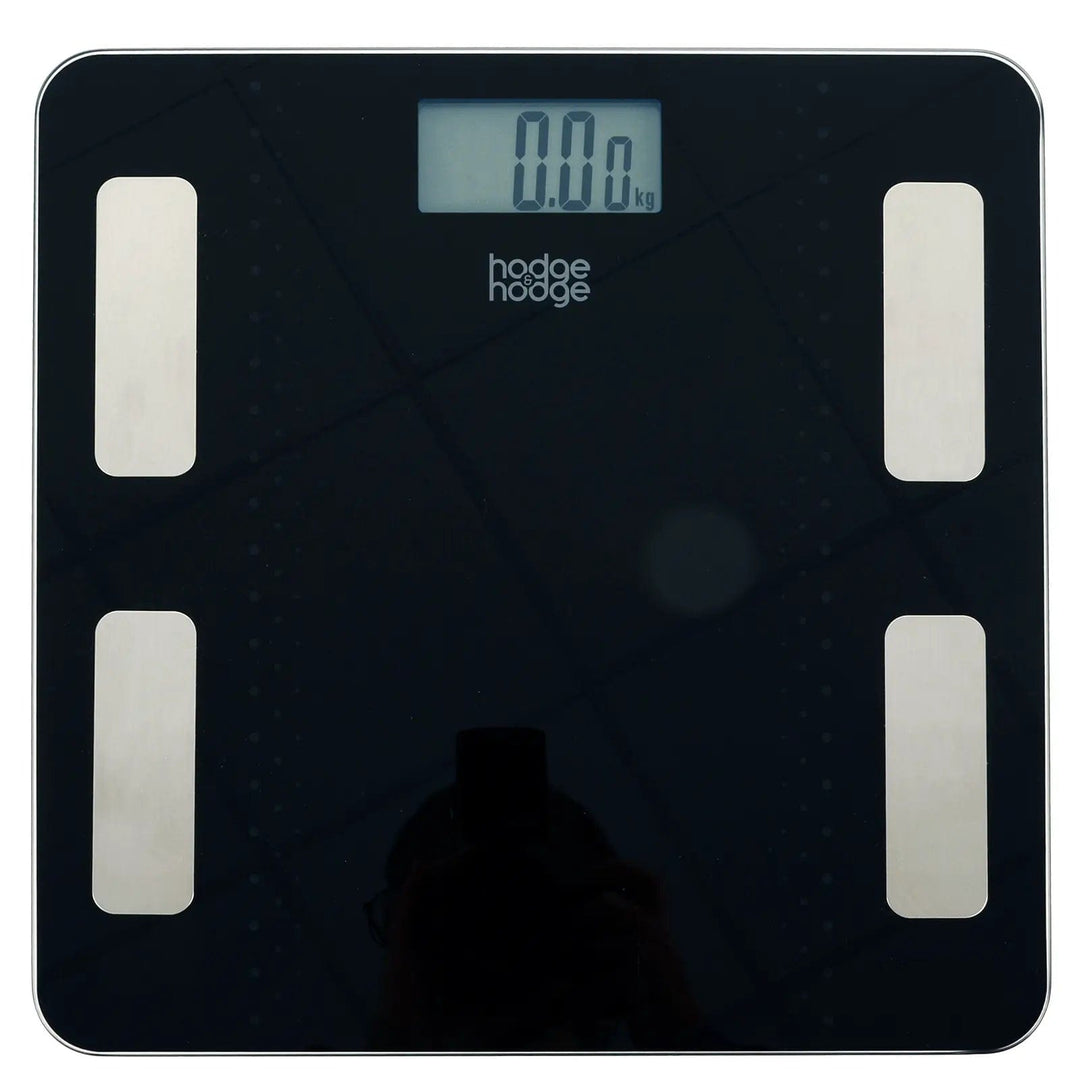 Top view of hodge and hodge black bathroom scales with blue backlit LCD display, 4 silver sensors on a glass platform