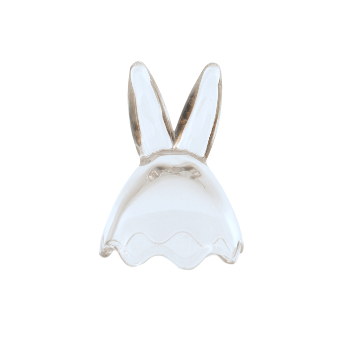 close up shot of bunny ears glass lid on white background