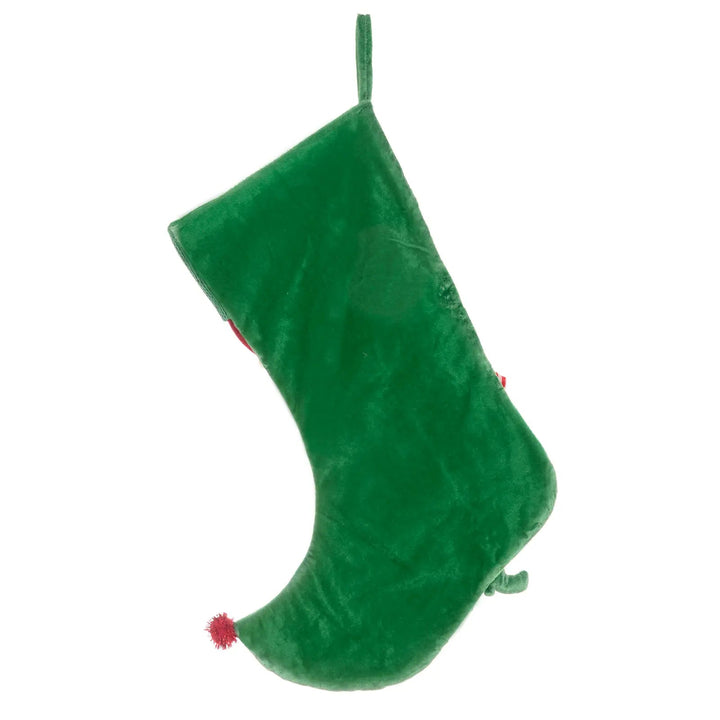 Back of a green Christmas stocking with red pom pom