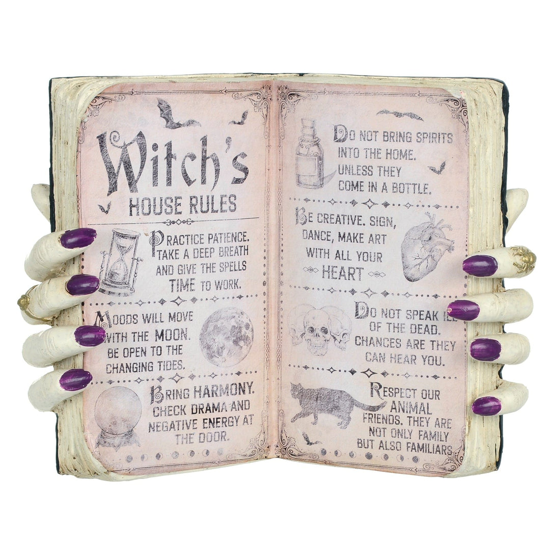 Witch's House Rules Book Halloween Decoration with hands and purple painted nails