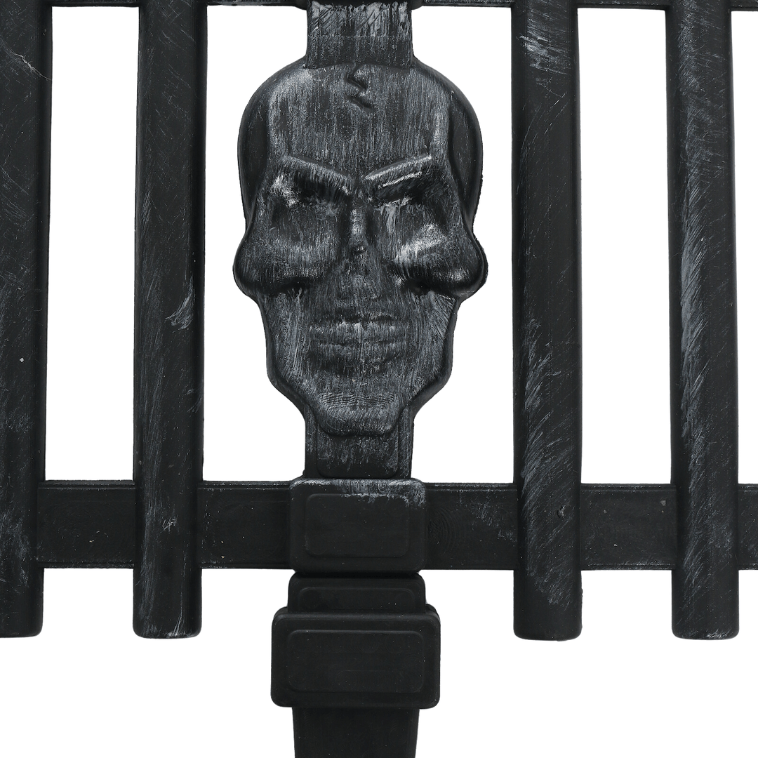 close up of skull on fence piece featuring silver aged effect