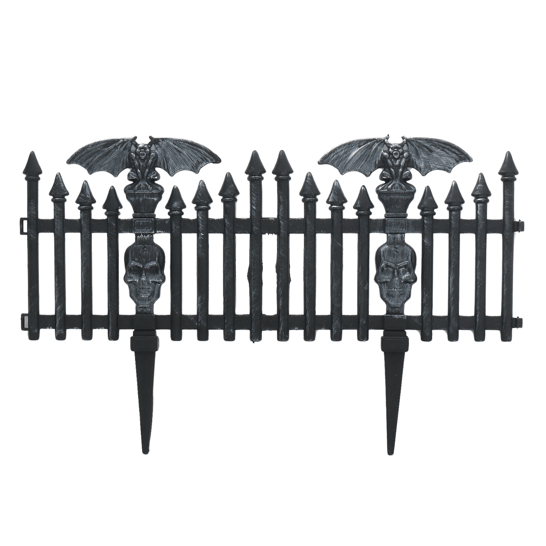 front view of garden stake halloween fence with goblins and skulls