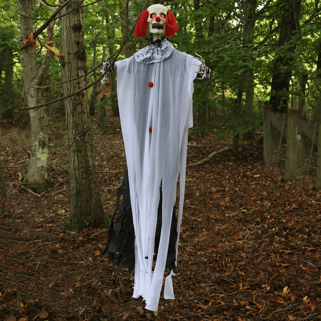 6ft scary clown hanging from tree in spooky forest setting