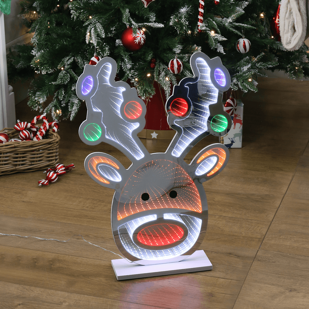 reindeer infinity light in front of christmas tree with candy cane baubles in the background