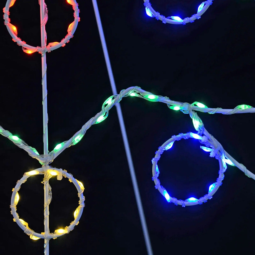 LED microlights in red, blue, yellow and green on a white wire frame Christmas decoration