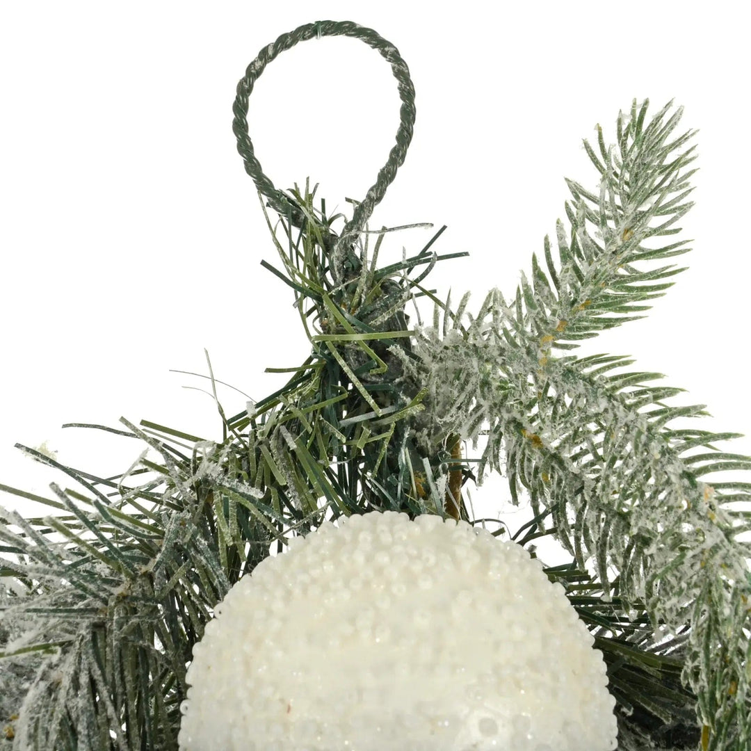 Close up of wire hanging loop at the end of  a Christmas garland