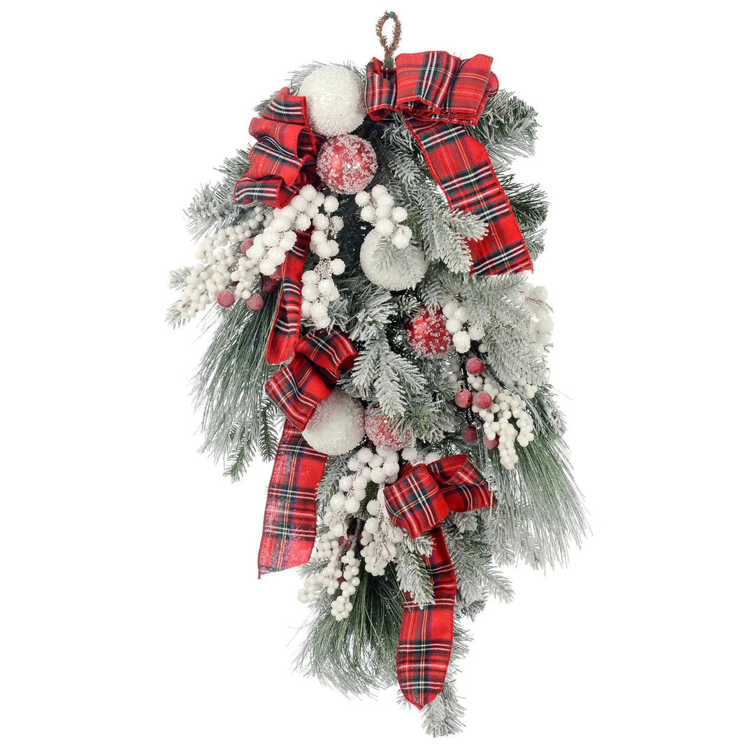 Christmas teardrop swag with red tartan ribbon, red and white baubles, snowberries and frosted green pine foliage