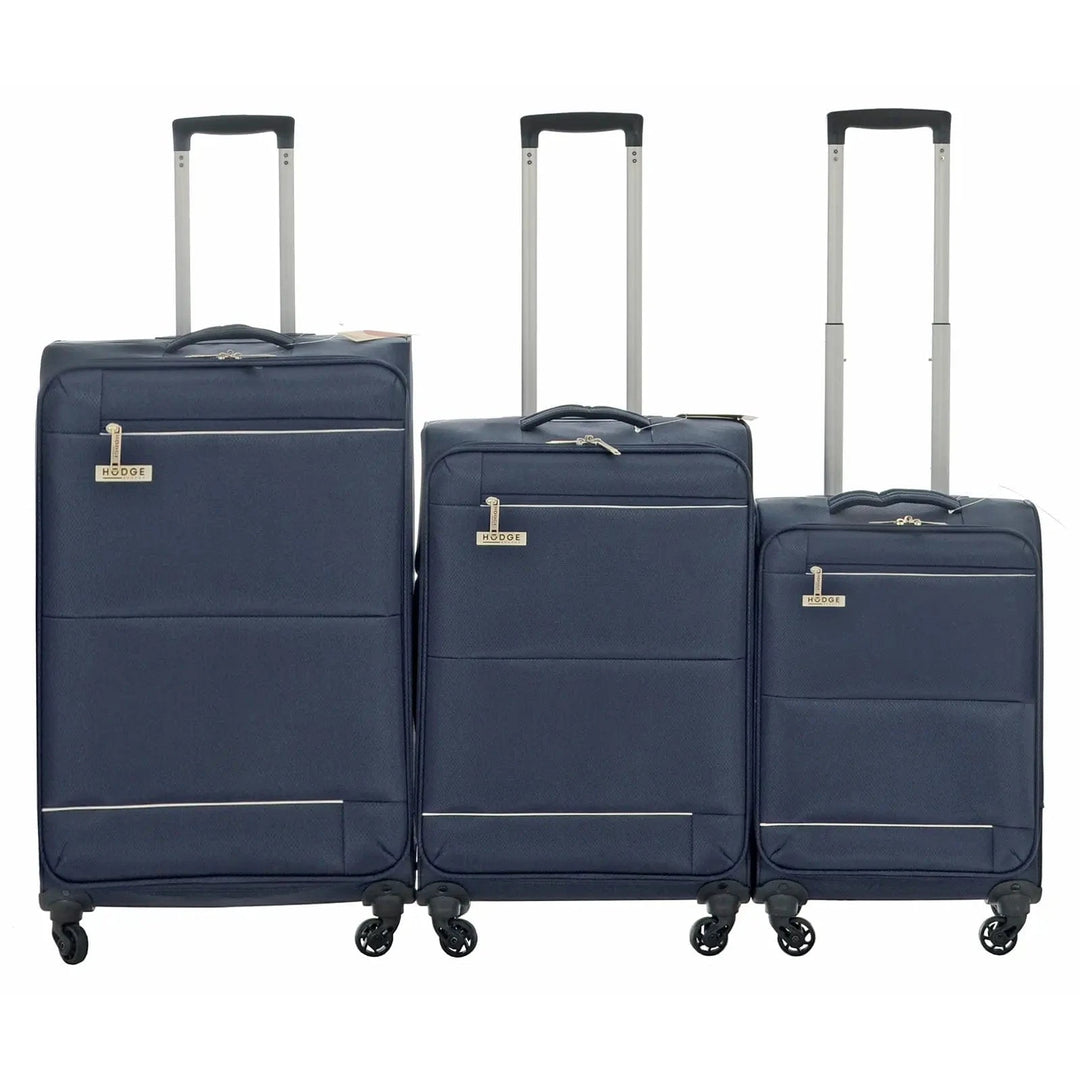 Set of 3 navy different size trolley cases with handles extended