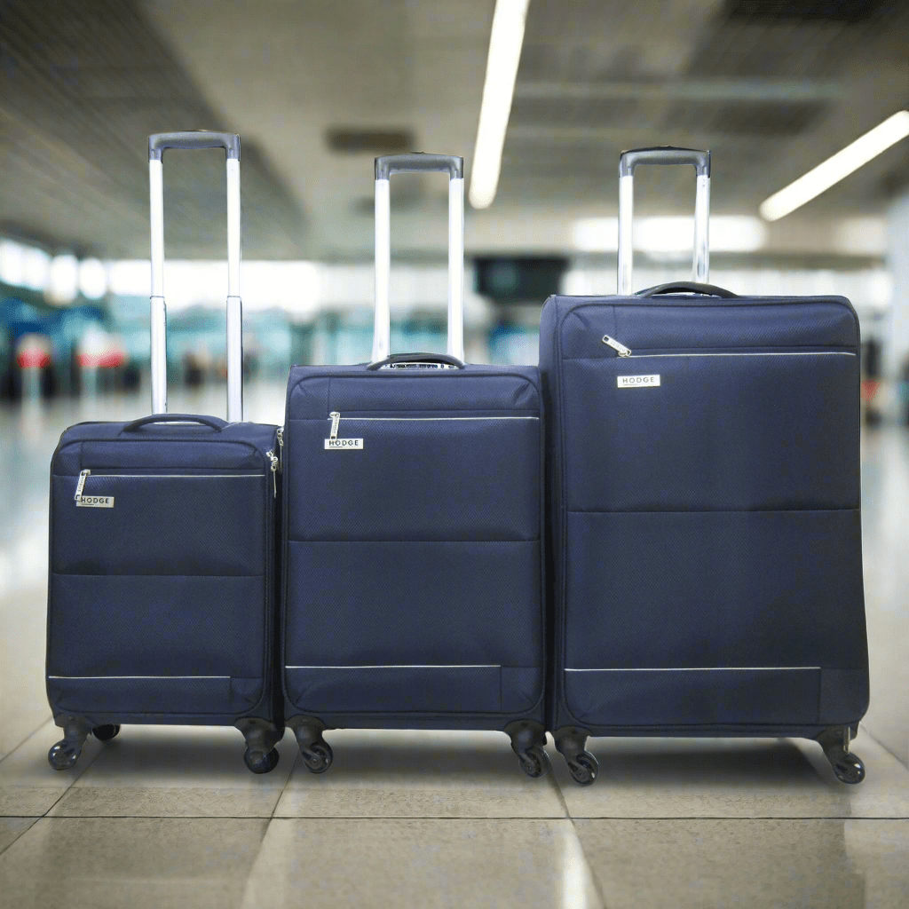 Navy Blue H&H Luggage In airport departure area