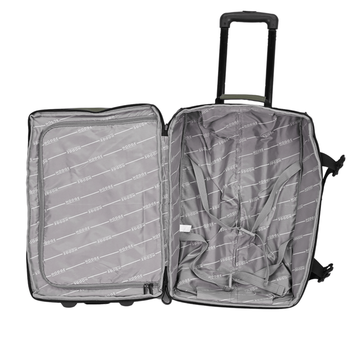 shot of suitcase interior featuring large main compartment with branded lining, compression straps and an additional zipped section on opposite side
