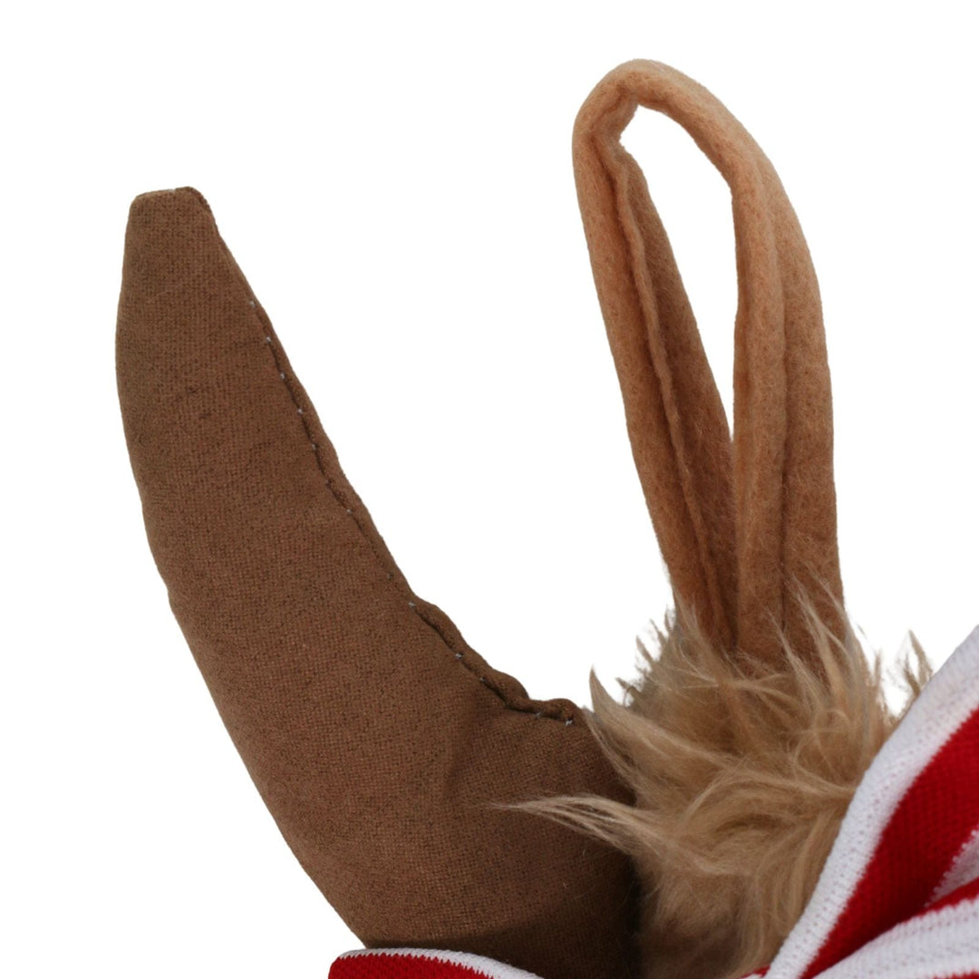 Close-up of a brown cow stocking with long ears and hanging loop on a white background