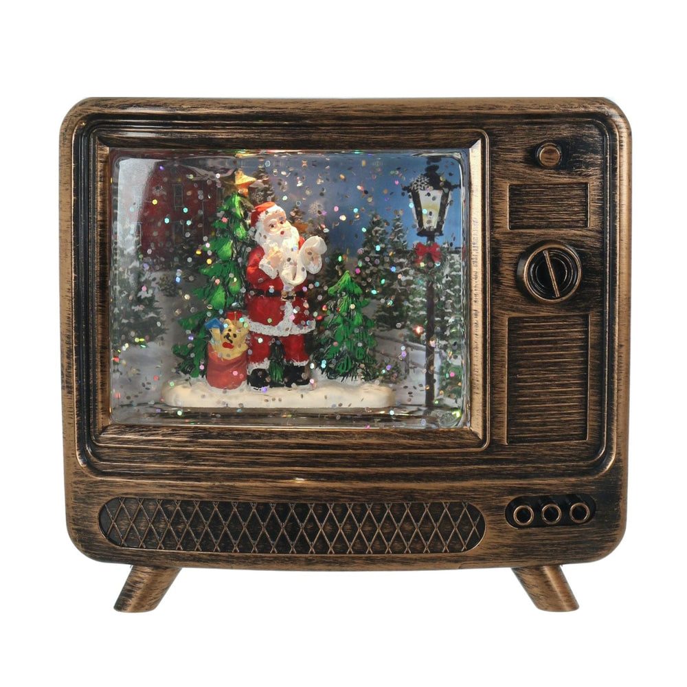 golden tv ornament with santa scene and glitter inside
