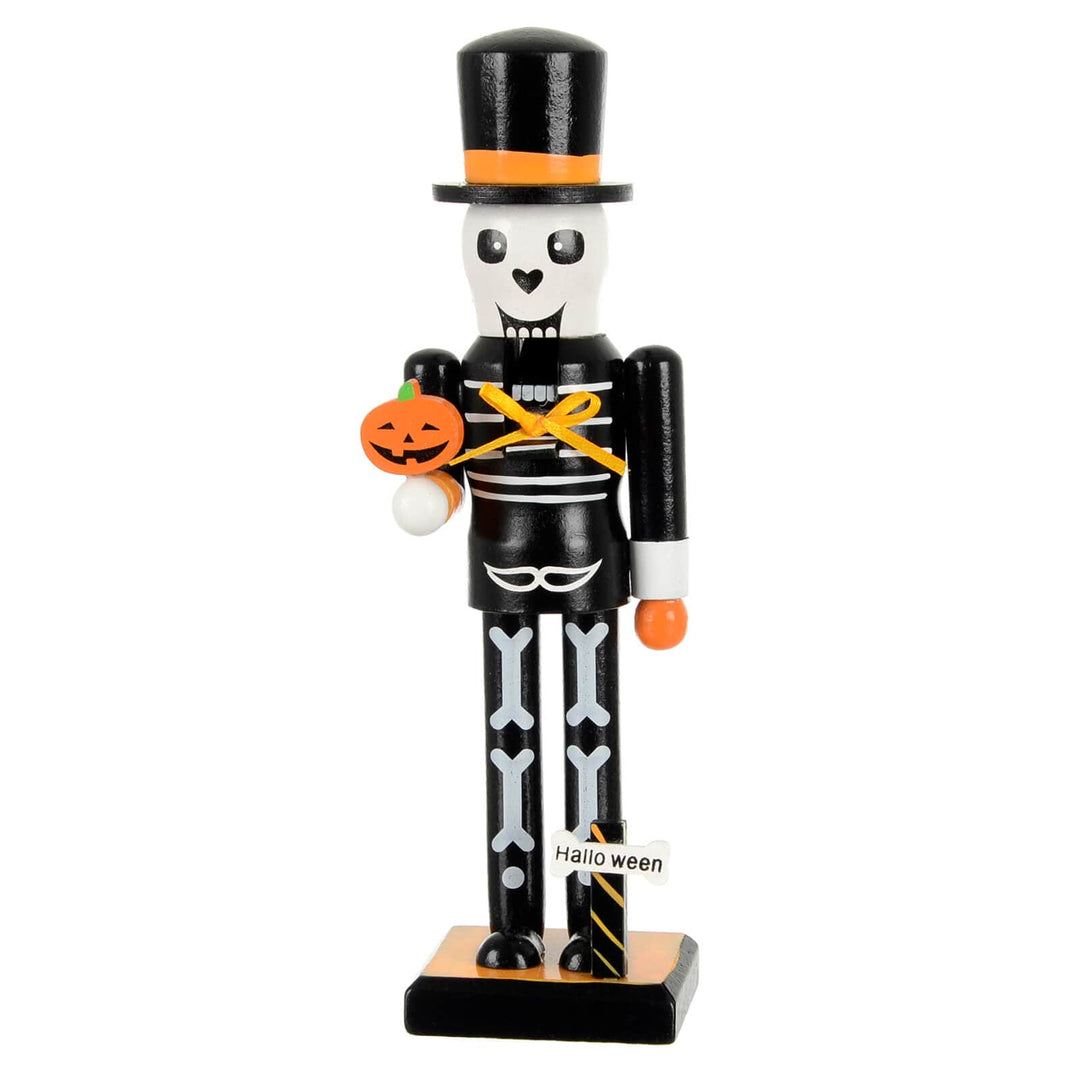 Skeleton Halloween figure holding a pumpkin lollipop
