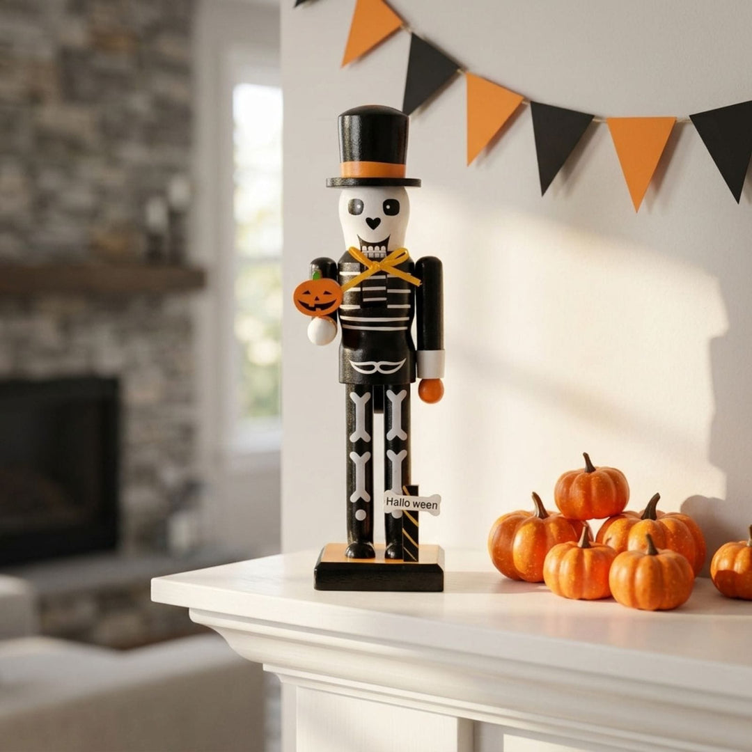skeleton nutcracker decoration on wooden fireplace ledge with black and orange bunting in background and mini pumpkins to the side