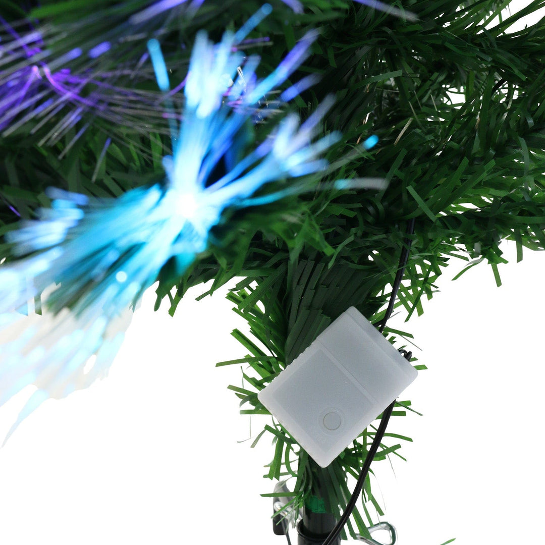 close up shot of light control box at base of christmas tree